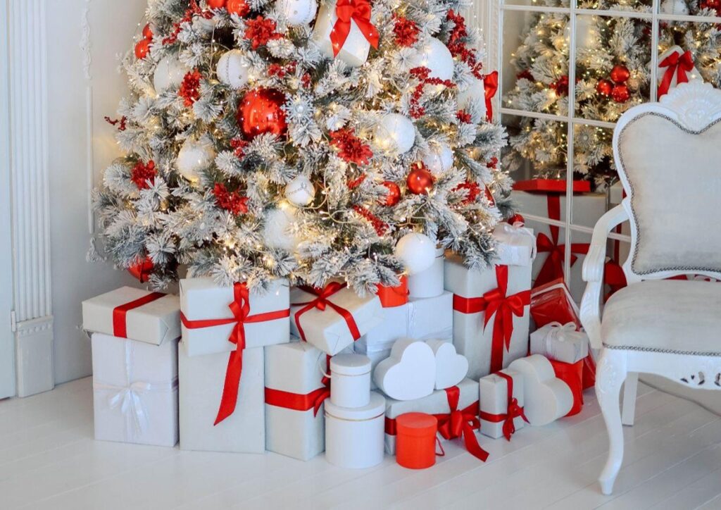 Christmas tree and gifts, white and red tones.